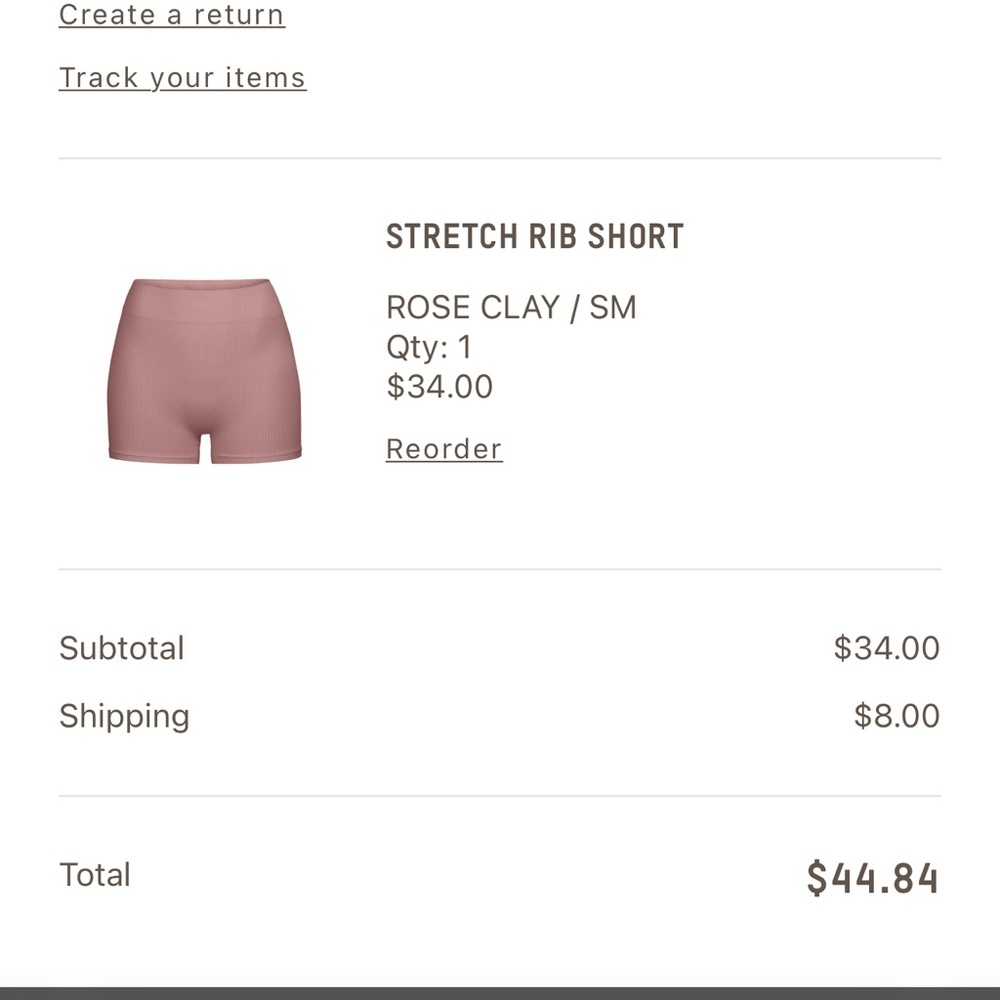 SKIMS stretch rib short in color rose clay size S/M